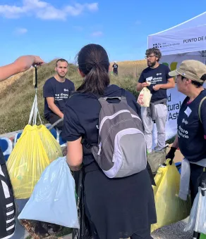 volunteers at a beach cleanup initiative.