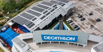 Decathlon store with solar panels on roof.