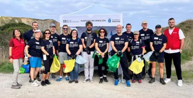 volunteers at a beach cleanup initiative.